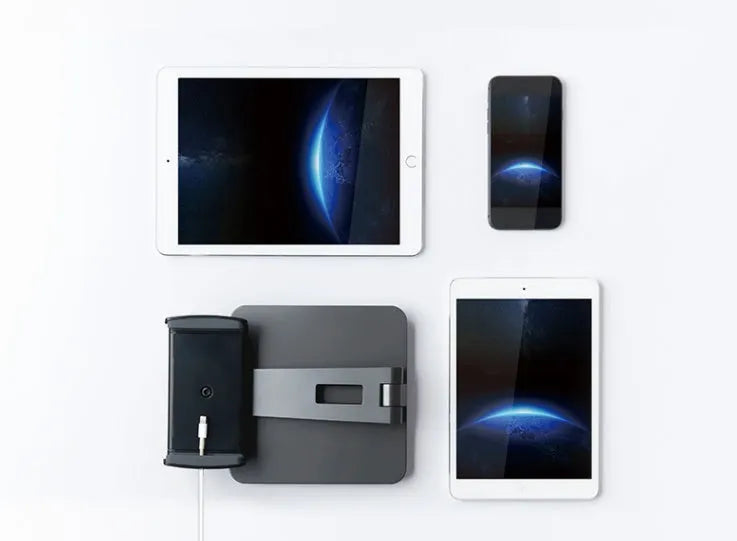 Foldable aluminium and ABS desktop stand holding a tablet at an angle.