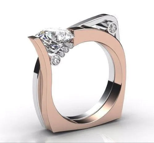 Rose gold geometric alloy couple ring with zircon inlay on a white background