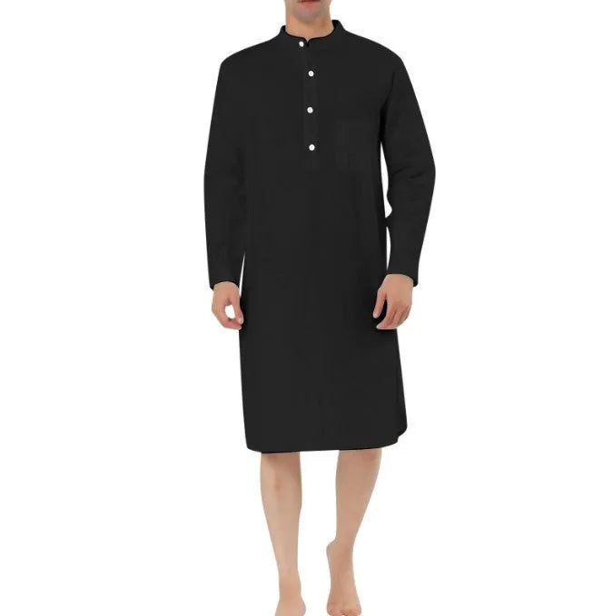 Man wearing a dark blue cotton robe shirt with button front and chest pocket