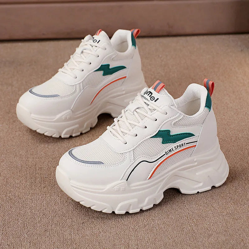 Women's white sports shoes with cross shoulder straps and height increasing insoles