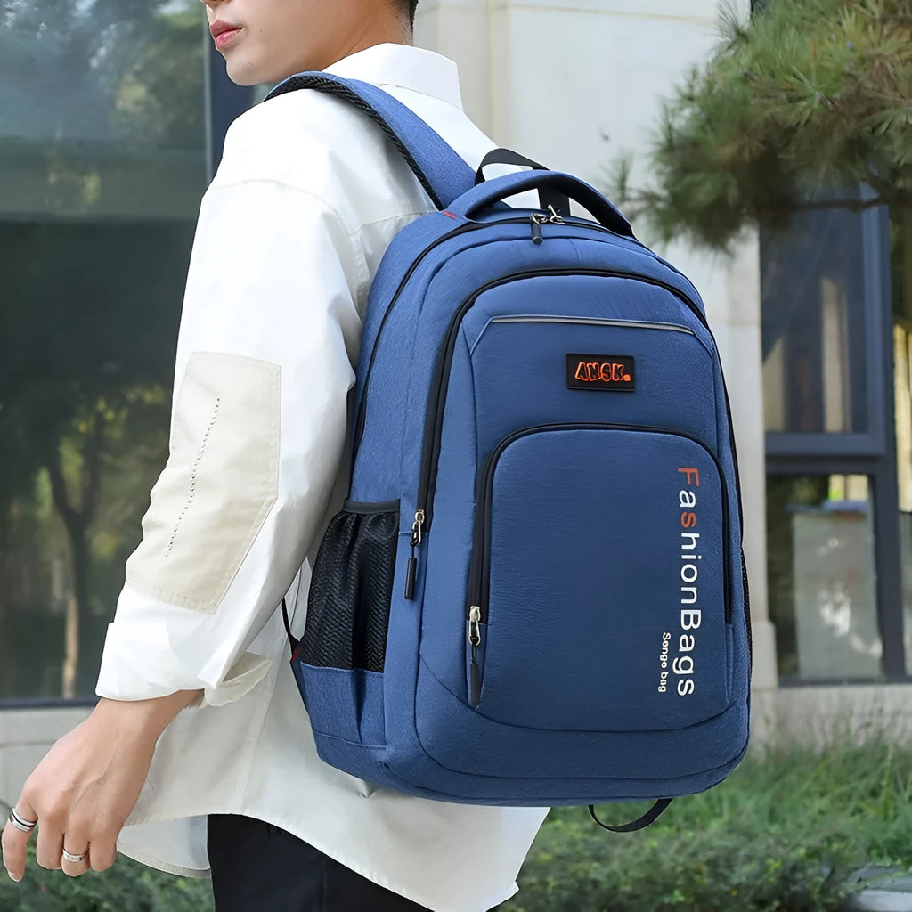 Large black nylon backpack showing multiple compartments and breathable shoulder straps