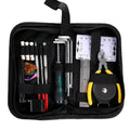 Black plastic guitar repair tool kit case with metal maintenance tools for string instruments