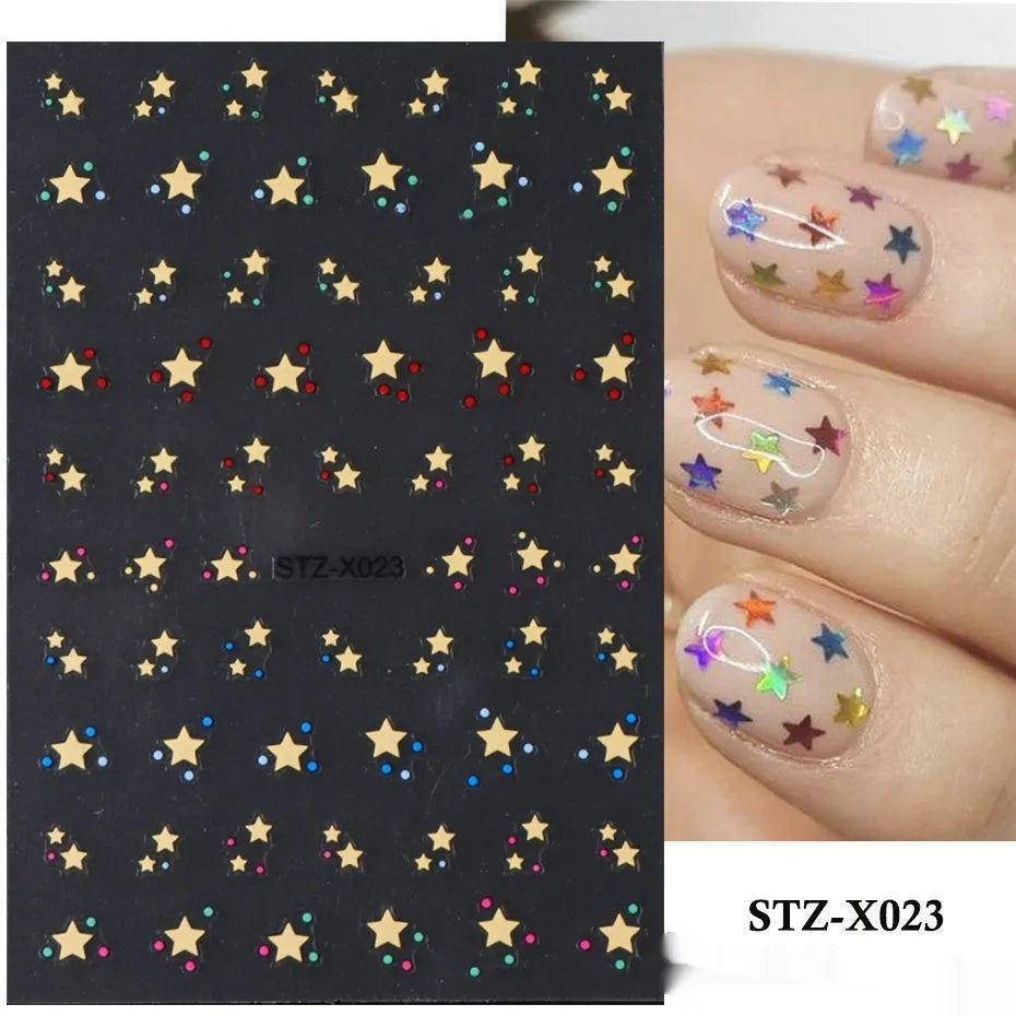 Close-up of a cartoon-style nail sticker with black and silver strips and a love pattern design on a fingernail.