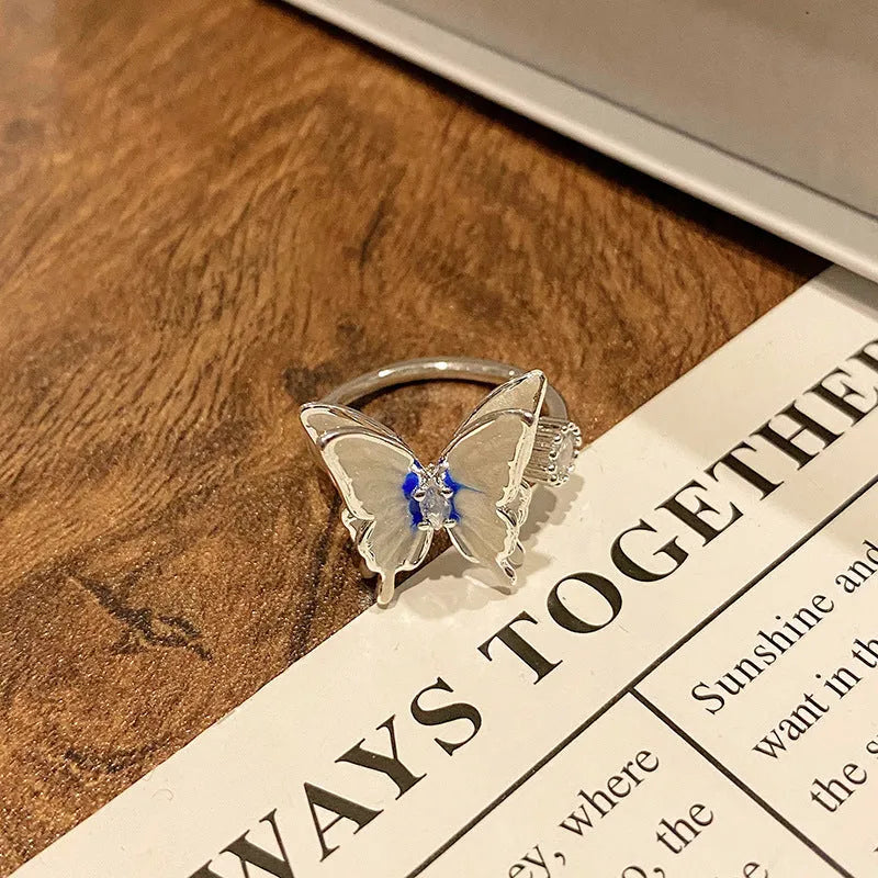 Copper Chinese butterfly women's ring showing creative design with oil dripping treatment finish