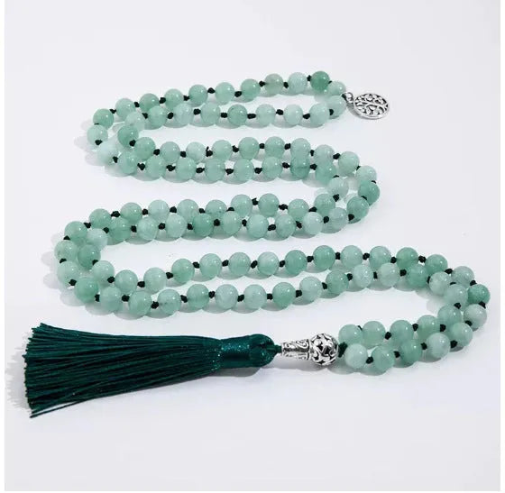 Handmade knotted beaded necklace with stone pendant showing 108 beads and geometric design