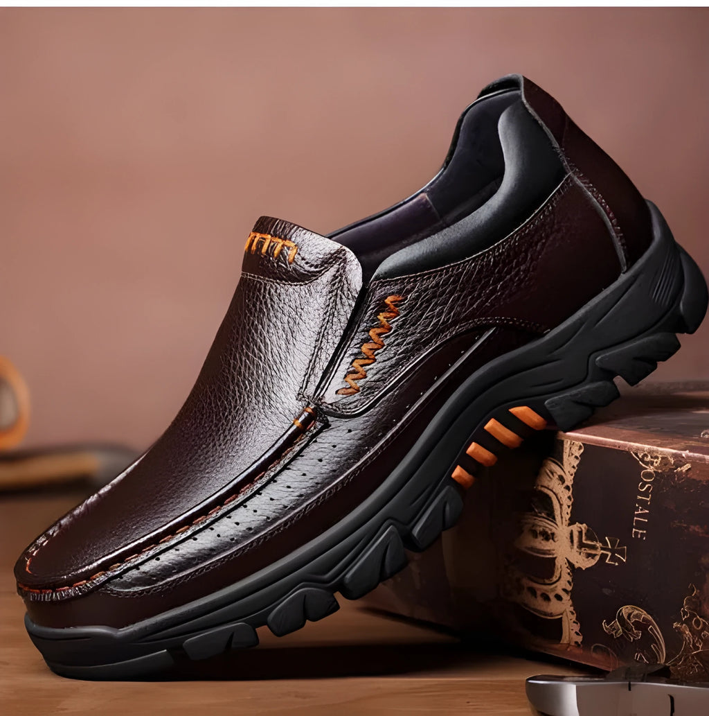 Men's black and brown leather slip-on business casual shoes with a rubber sole.