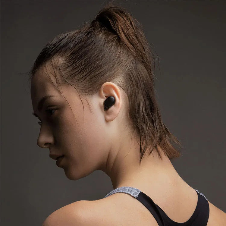 Redmi AirDots 2 Black true wireless earphones with their compact charging case.