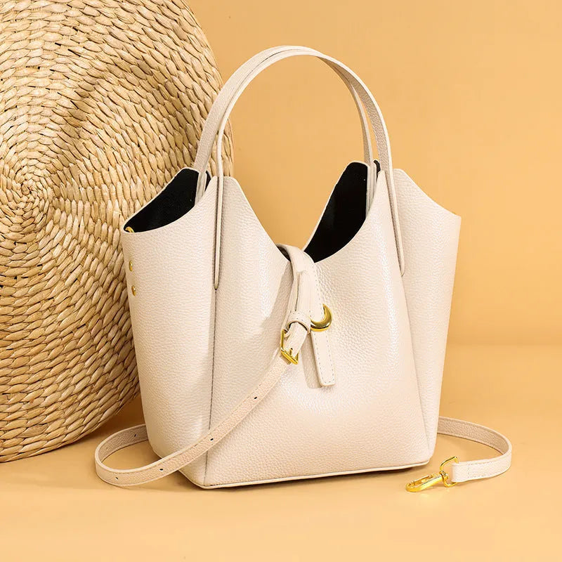 Genuine leather women's bucket handbag in retro style with large capacity and organisational features