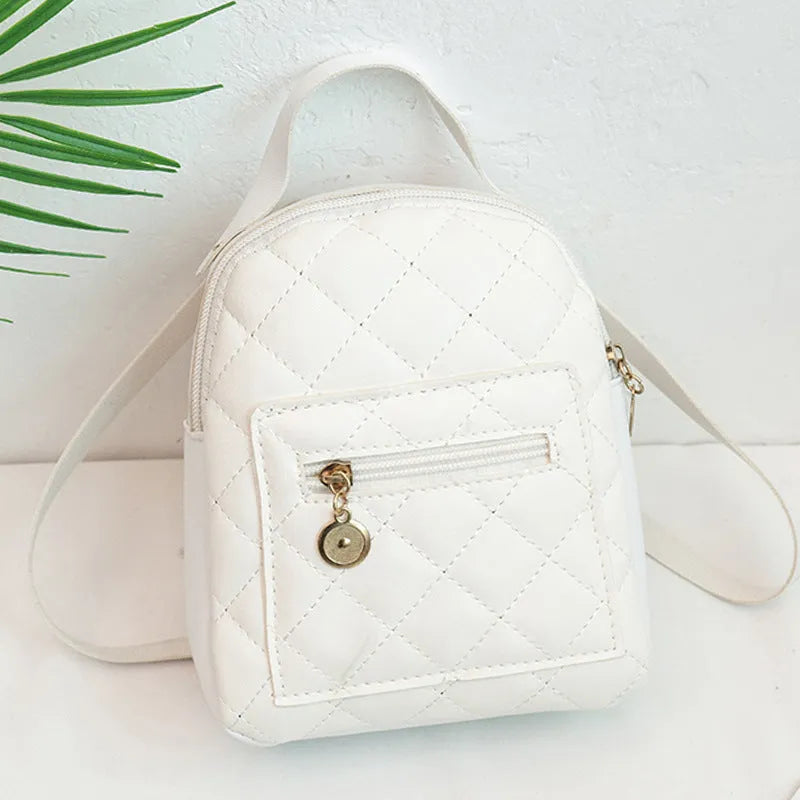 Girls' hard PU backpack with Korean embroidery in black, vertical square shape with soft carry handle
