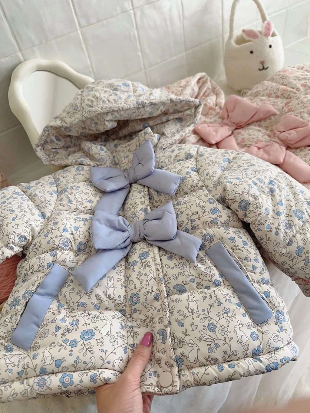 Baby girl floral print hooded winter jacket with bow in blue and white porcelain blue colour