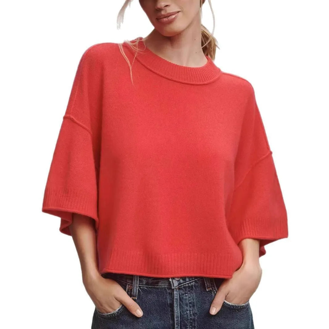 Red cropped viscose T-shirt with regular sleeves and an exposed navel design on a mannequin.