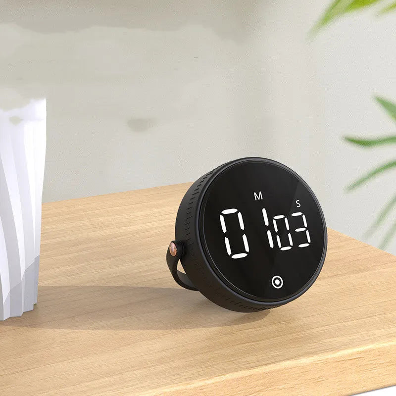 Kitchen silent rotary adjustable digital timer with LED display, black, showing rotary dial and countdown