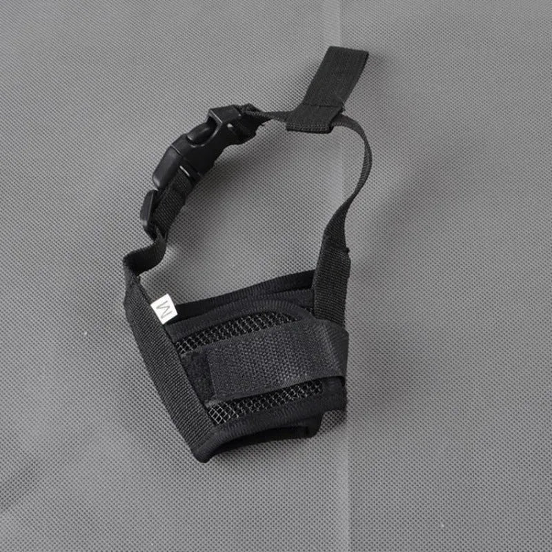 Adjustable plastic basket-style dog muzzle in red, shown on a dog's snout with quick-release buckle.