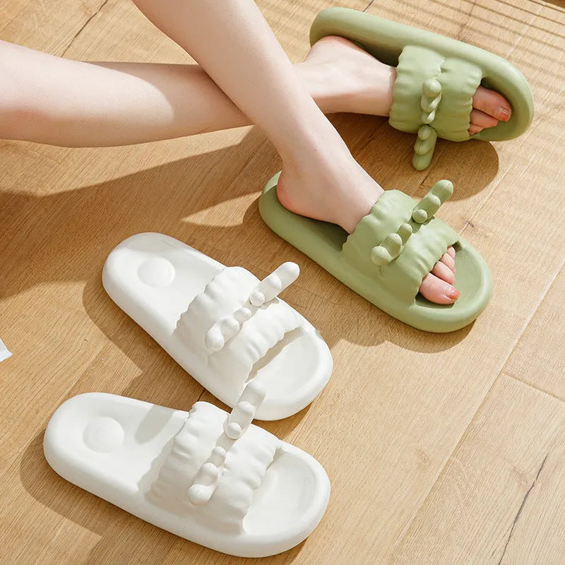 Women's deer horn design flip flop slippers in EVA material, shown in light yellow colour.