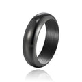 Glossy electroplated titanium steel ring in gold, black, and steel colours showing band detail