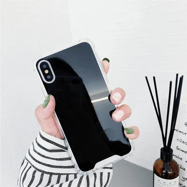 Mirrored back protective TPU case for iPhone on a table