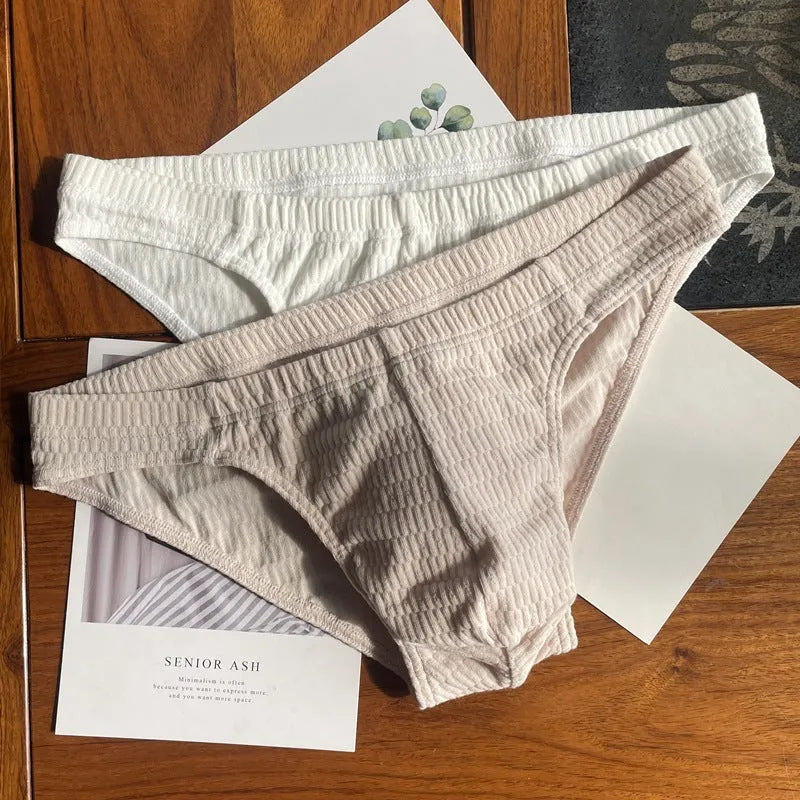 Men's cotton briefs in solid colours showing mid waist and triangle design