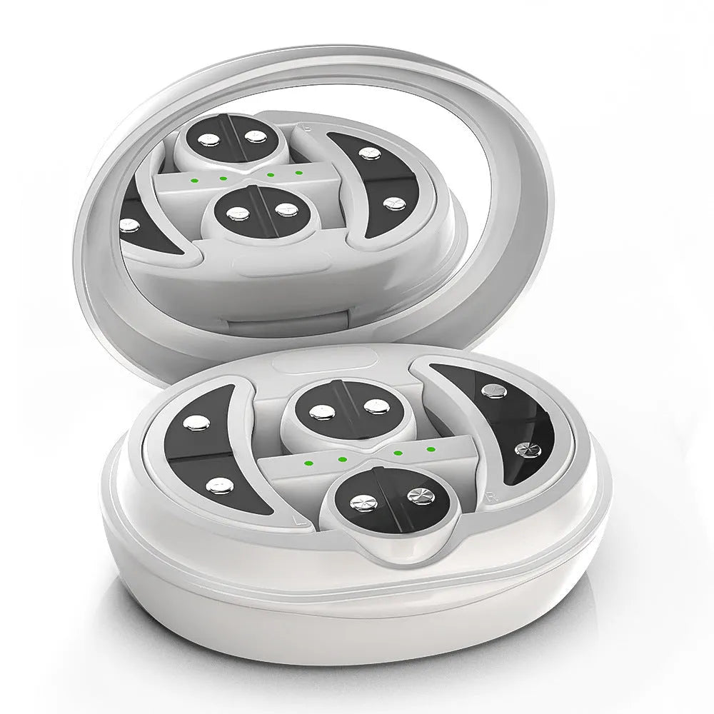 White wireless red light EMS eye and facial massager device on a table