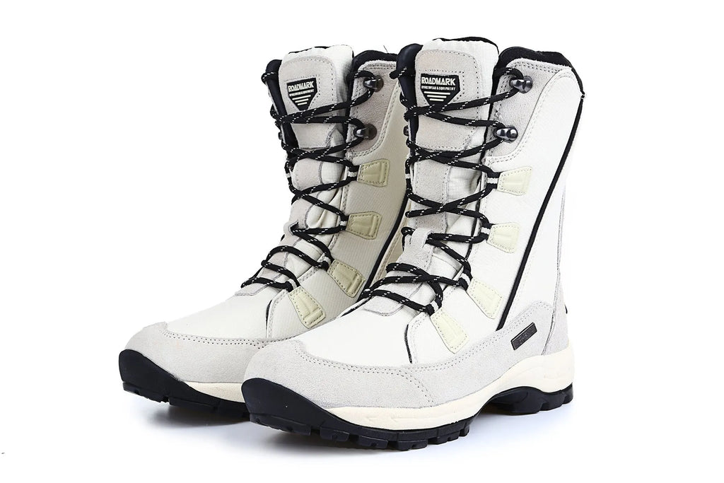 Women's mid-calf thermal snow boots in genuine leather with round toe and rubber sole