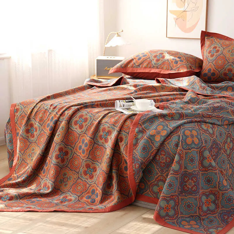 Cotton gauze three-piece bedding set with botanical plant and flower patterns including blanket and two pillowcases