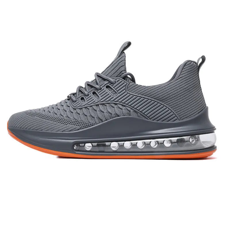 Men's black low-top running shoes with mesh upper and white rubber sole on a plain background.