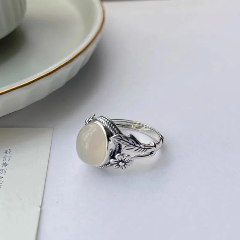 Adjustable copper vintage ring with imitation white chalcedony and antique finish