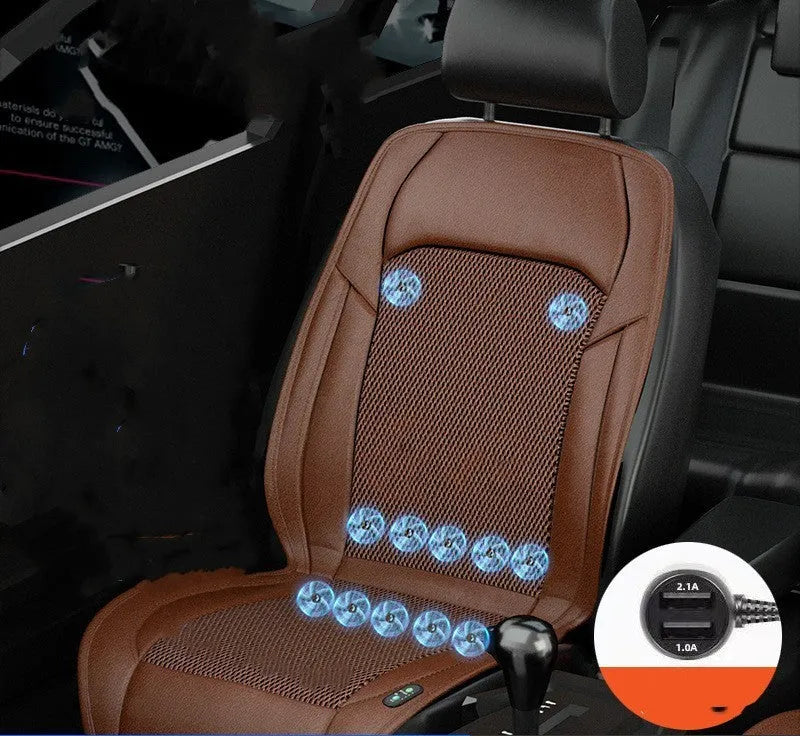 Black ventilated car seat cushion with multiple cooling fans, plugged into a 12V car socket.
