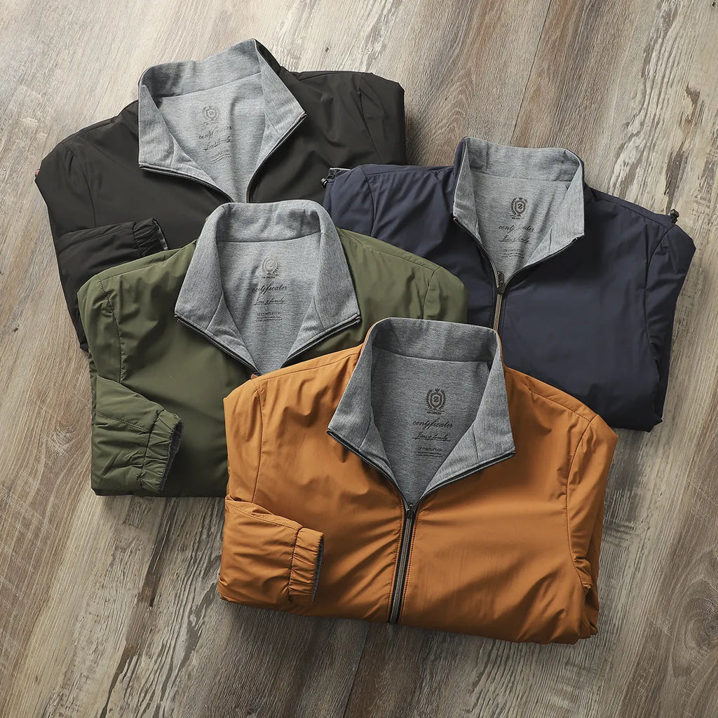 Men's simple stand collar jacket in polyester and cotton blend shown in one of four available colours.