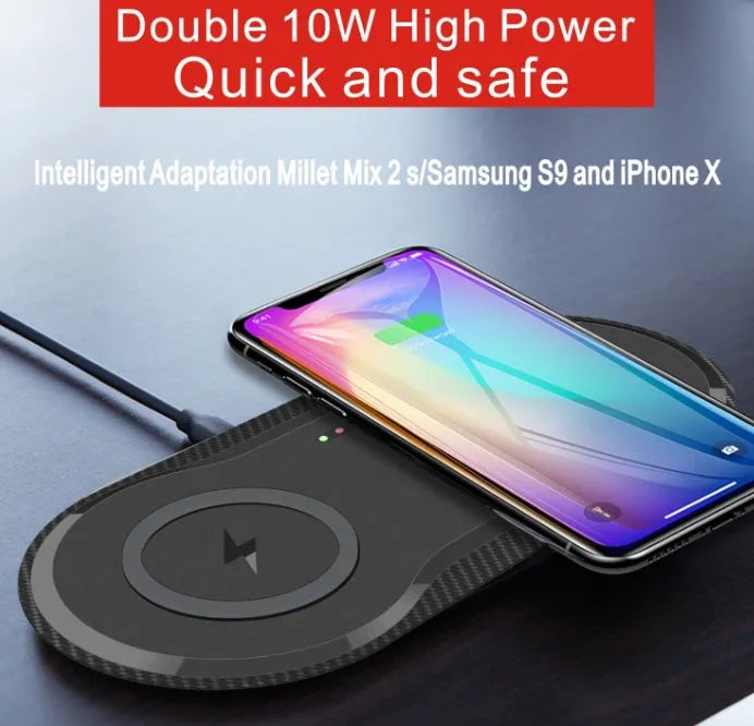 Black and white dual wireless charging pad showing two phones charging simultaneously