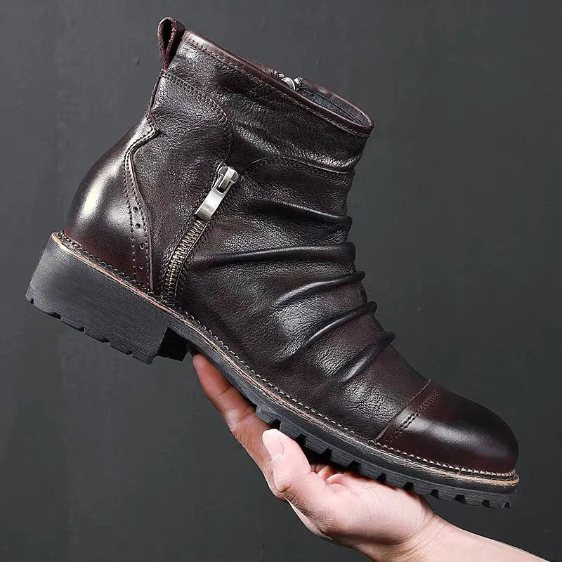 Men's black side-zip cowboy boots with a mid-calf shaft and horseshoe heel on a plain background