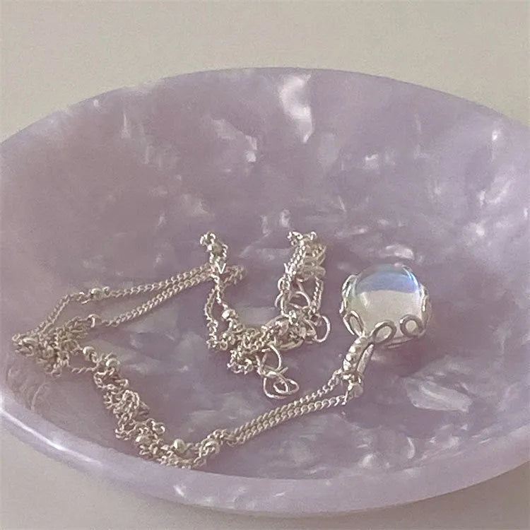 925 silver geometric round pendant necklace with ornamental stone on an adjustable curb chain.