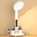 LED clock table lamp with foldable design, fan, and USB rechargeable battery on a desk