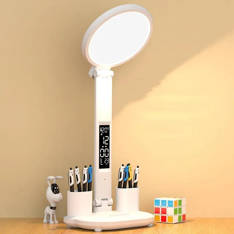 LED clock table lamp with foldable design, fan, and USB rechargeable battery on a desk