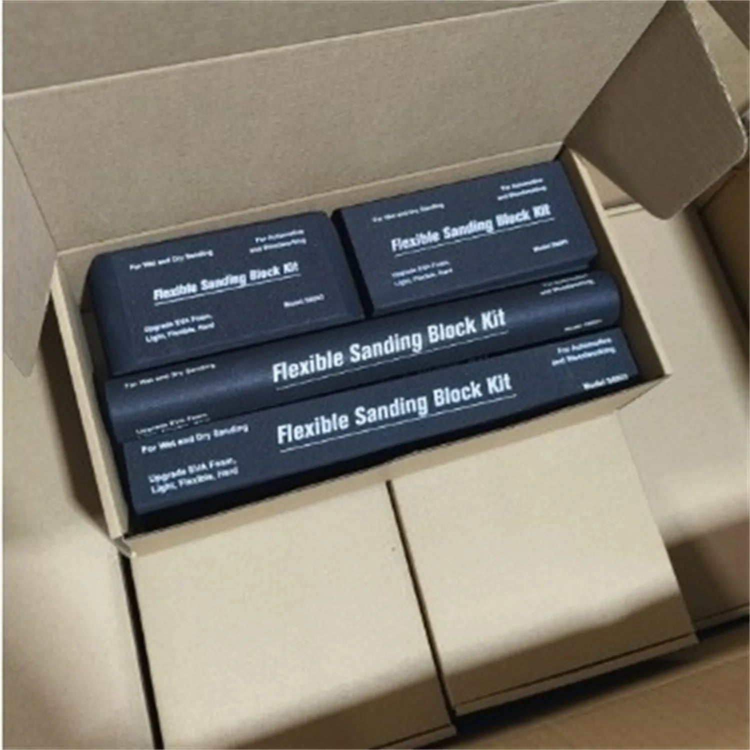 Set of seven black frosted EVA building blocks with visible metal connector fittings.