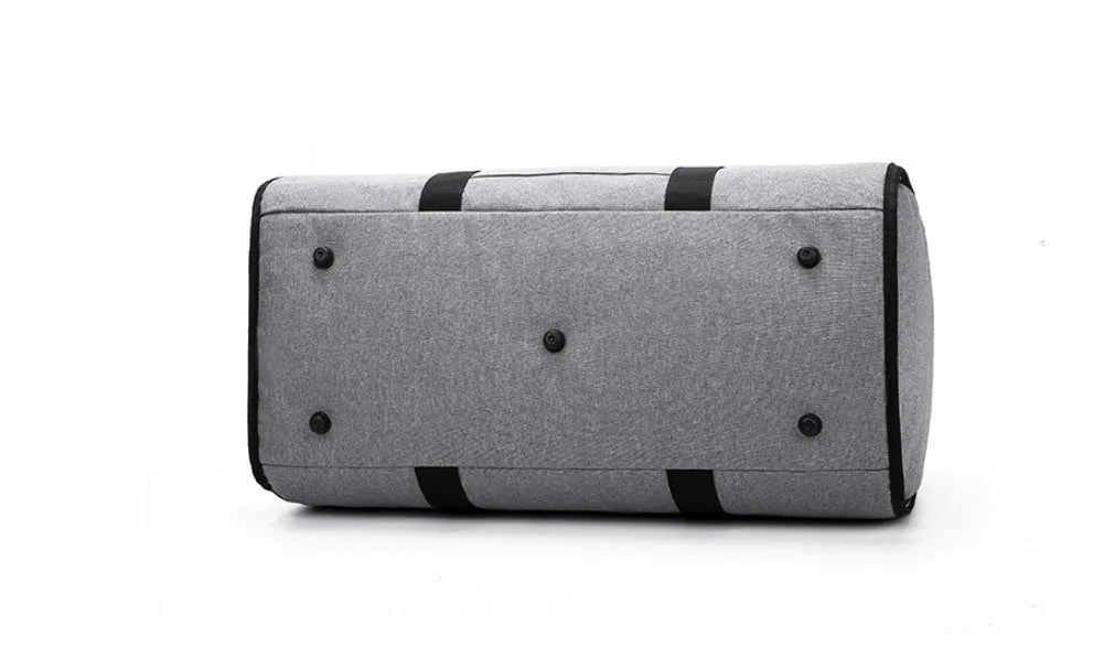 Medium sized cylindrical duffle travel bag in black, shown with zipper open, made from Oxford cloth.