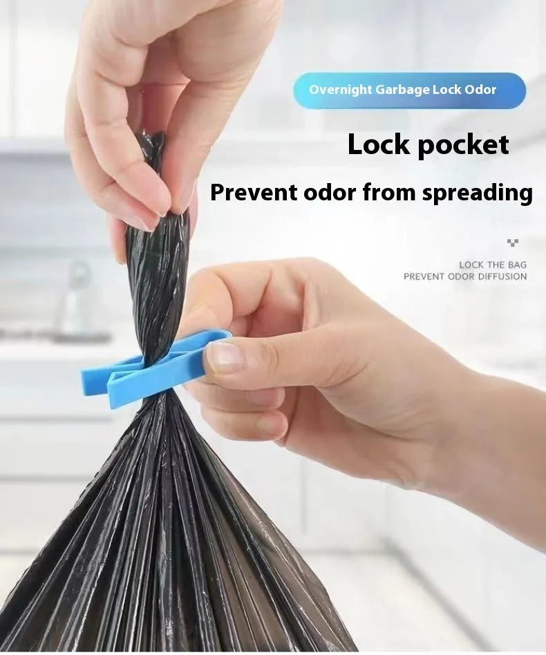 White PP plastic garbage bag fixing clip holding a black bin liner to a trash can rim.