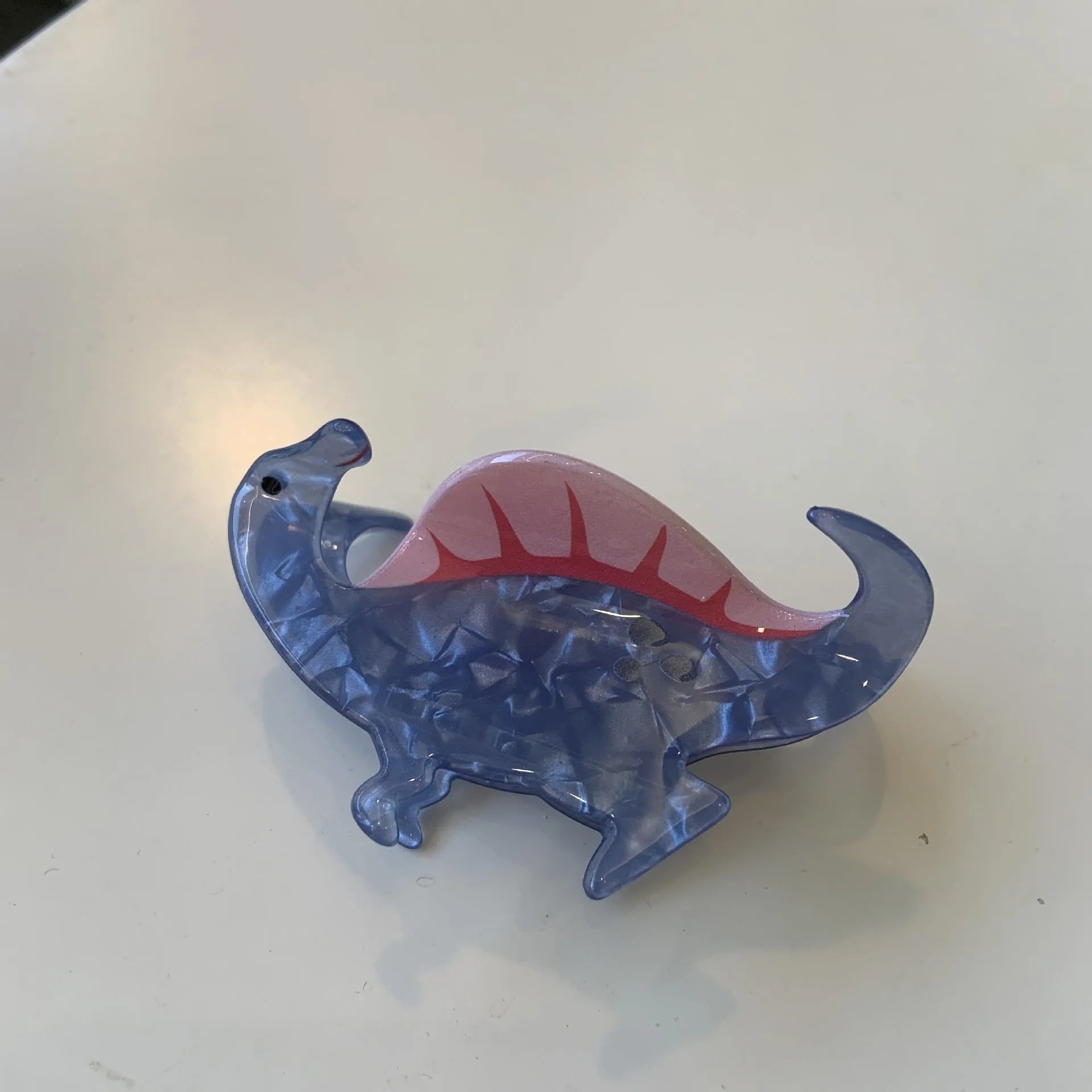 Acrylic dinosaur jaw hair clip in pink pterosaur colour with grip fastening mechanism