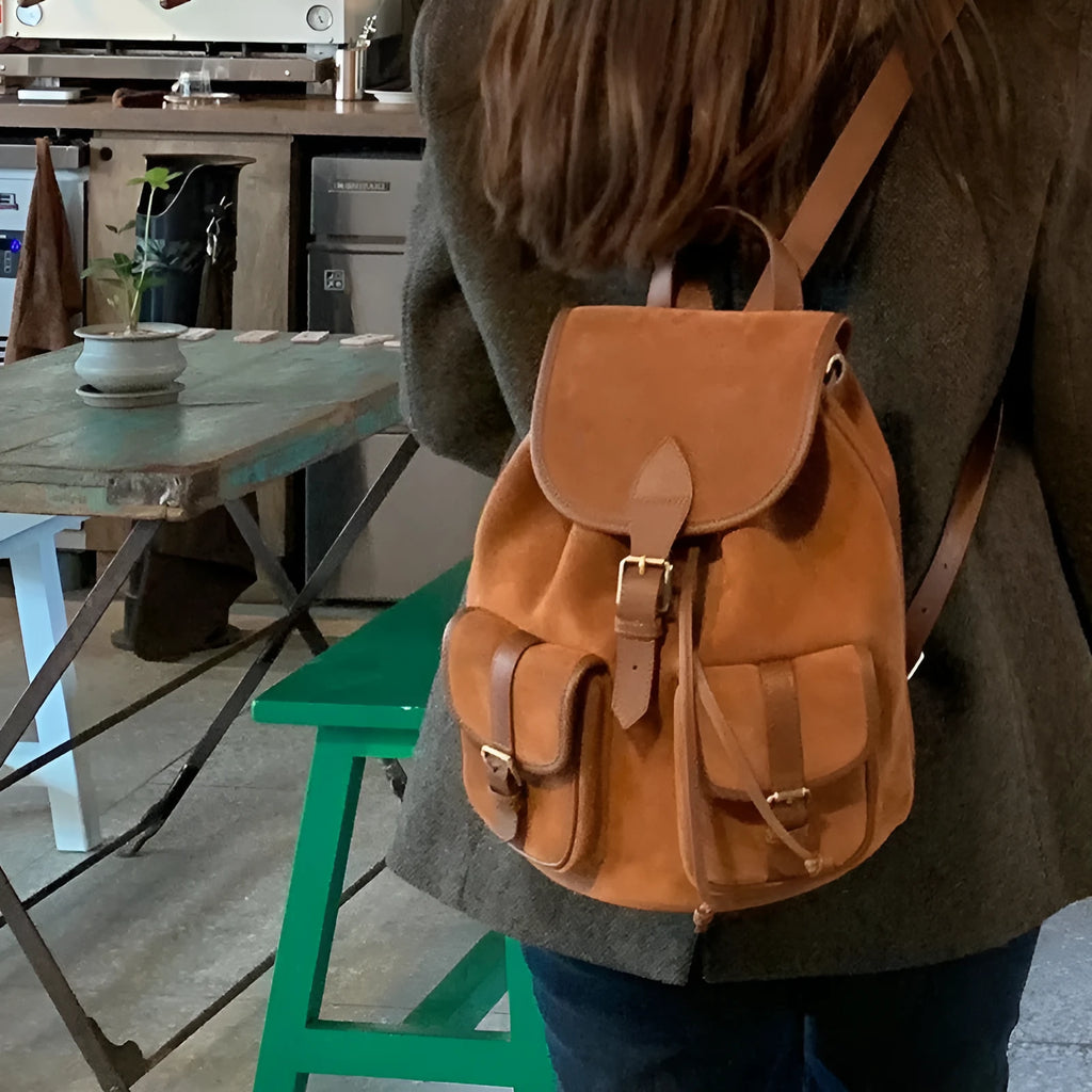 Women's light brown velvet frosted backpack with flap closure and double shoulder straps