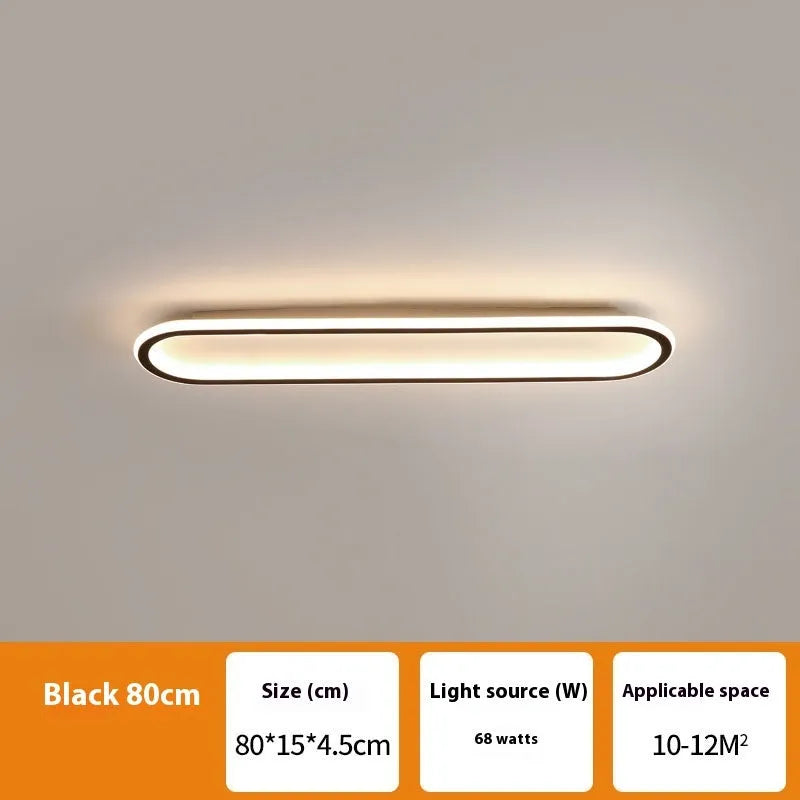 Slim aluminium strip ceiling lamp with PVC diffuser in a minimalist design for corridor or bedroom lighting.