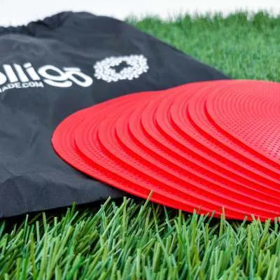 Soft yellow TPE football training landmark pad on grass, showing 23cm diameter.