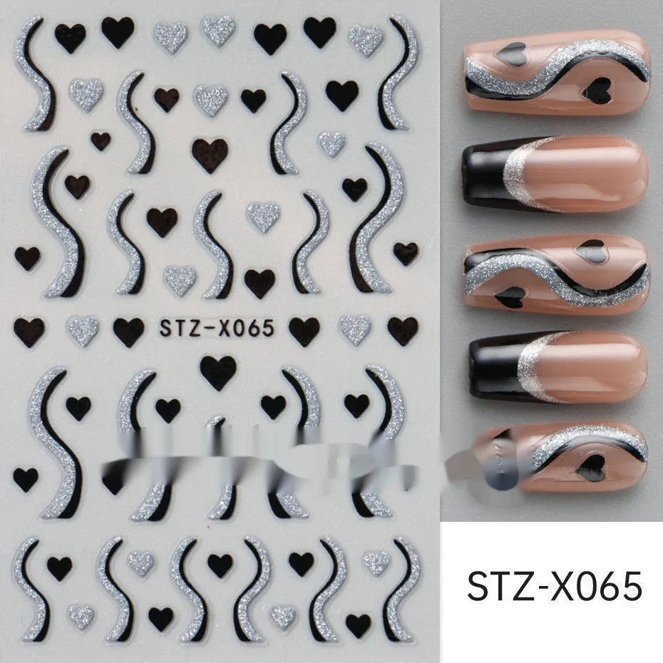 Close-up of a cartoon-style nail sticker with black and silver strips and a love pattern design on a fingernail.