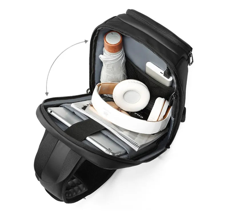 Black PVC outdoor leisure shoulder bag with internal organiser pockets and air cushion strap