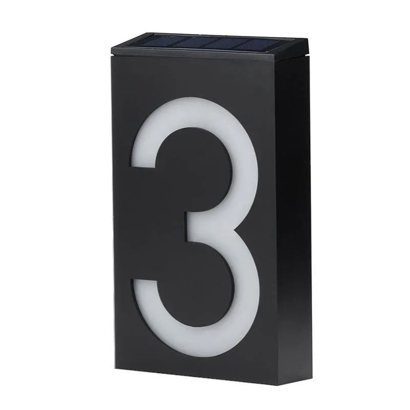 Solar powered house number light with LED illumination and waterproof housing for outdoor installation