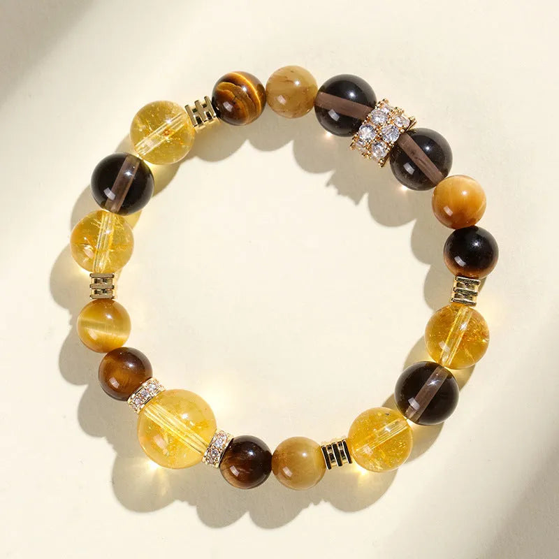 Yellow artificial crystal beaded bracelet with 10mm tower-shaped beads on wrist