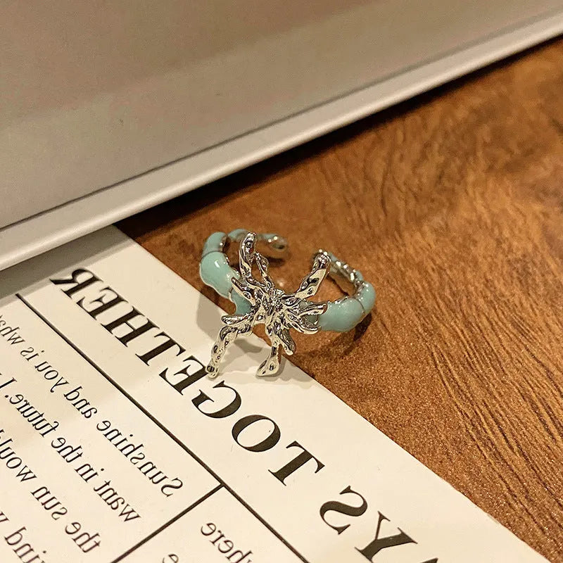 Copper Chinese butterfly women's ring showing creative design with oil dripping treatment finish