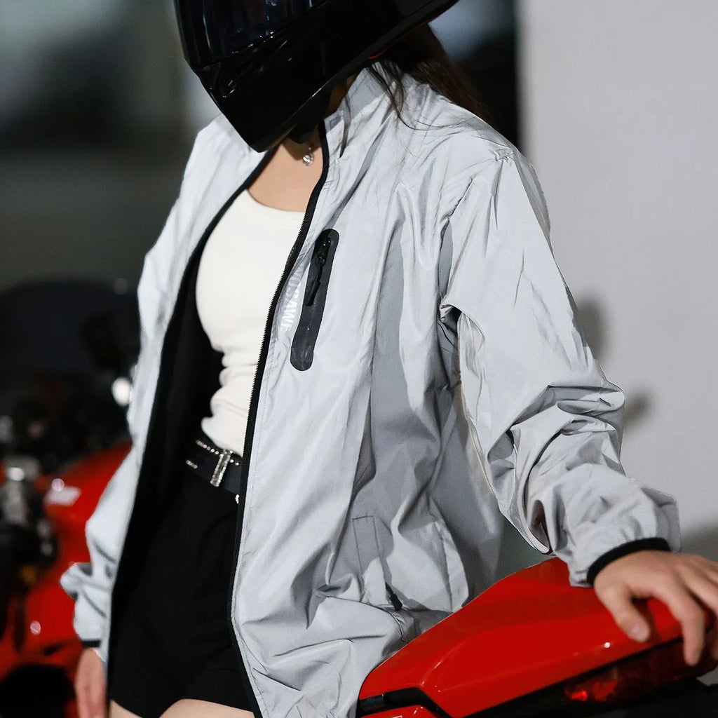 Waterproof polyester long sleeved windproof top in silver colour showing European sizing options