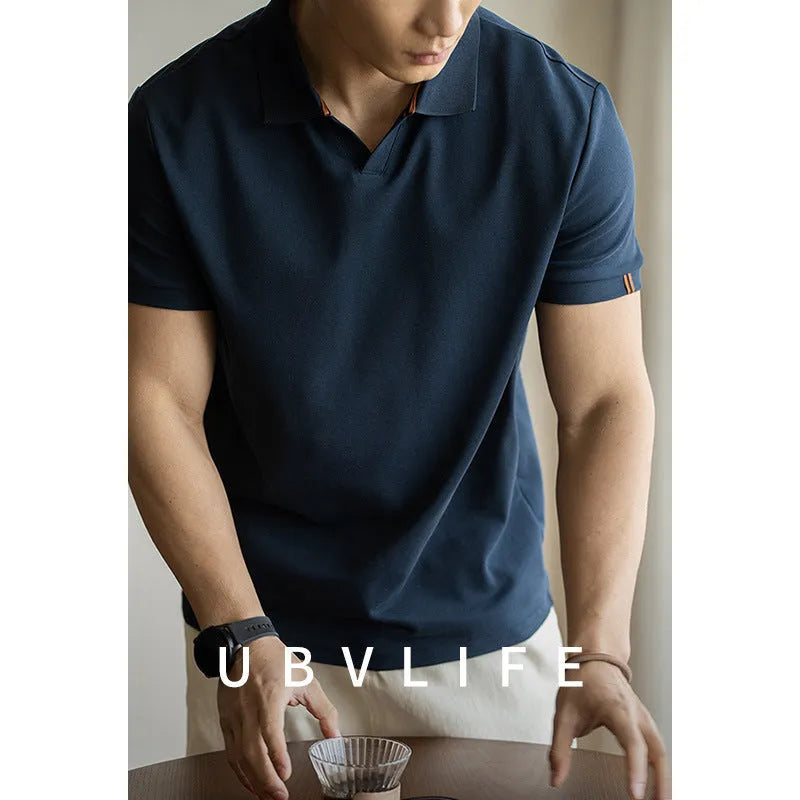 American-style blue cotton polo shirt with short sleeves on hanger