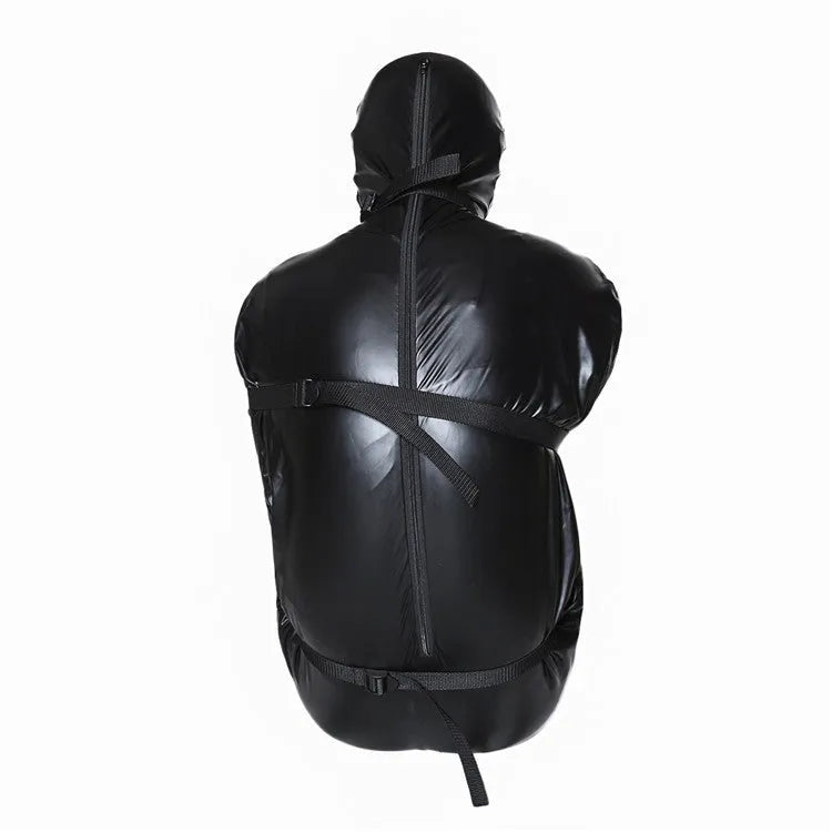 Black patent leather bondage suit with six ratchet tie down pieces for full body restraint