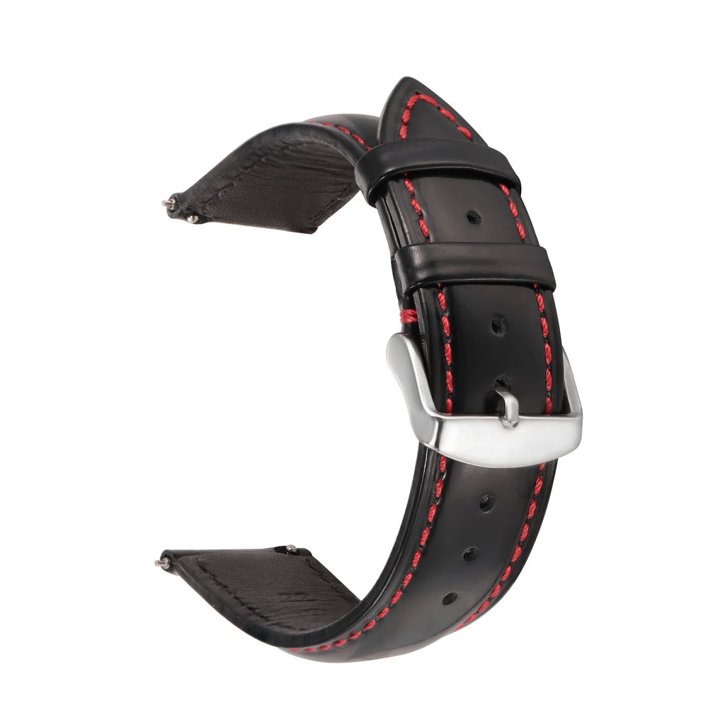 Quick-release cowhide leather watch strap in black with white accent line, showing the spring bar mechanism.