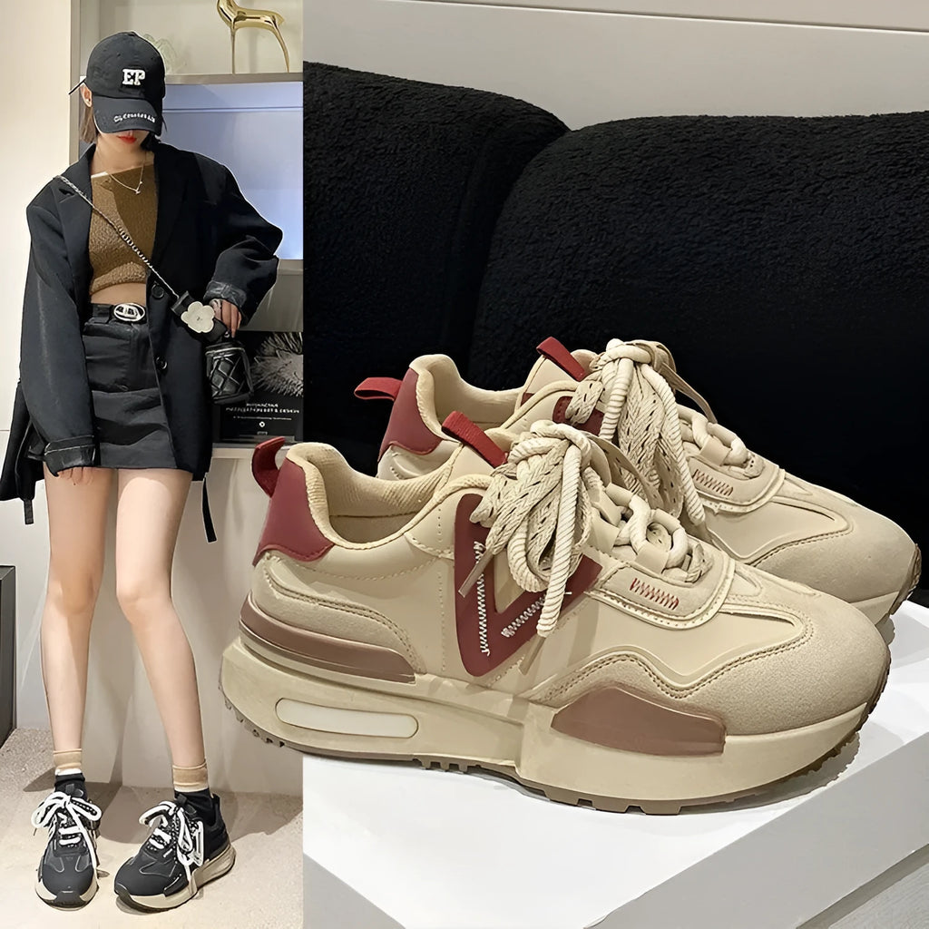 Women's black retro platform sports shoes with round toe and front lace-up closure.